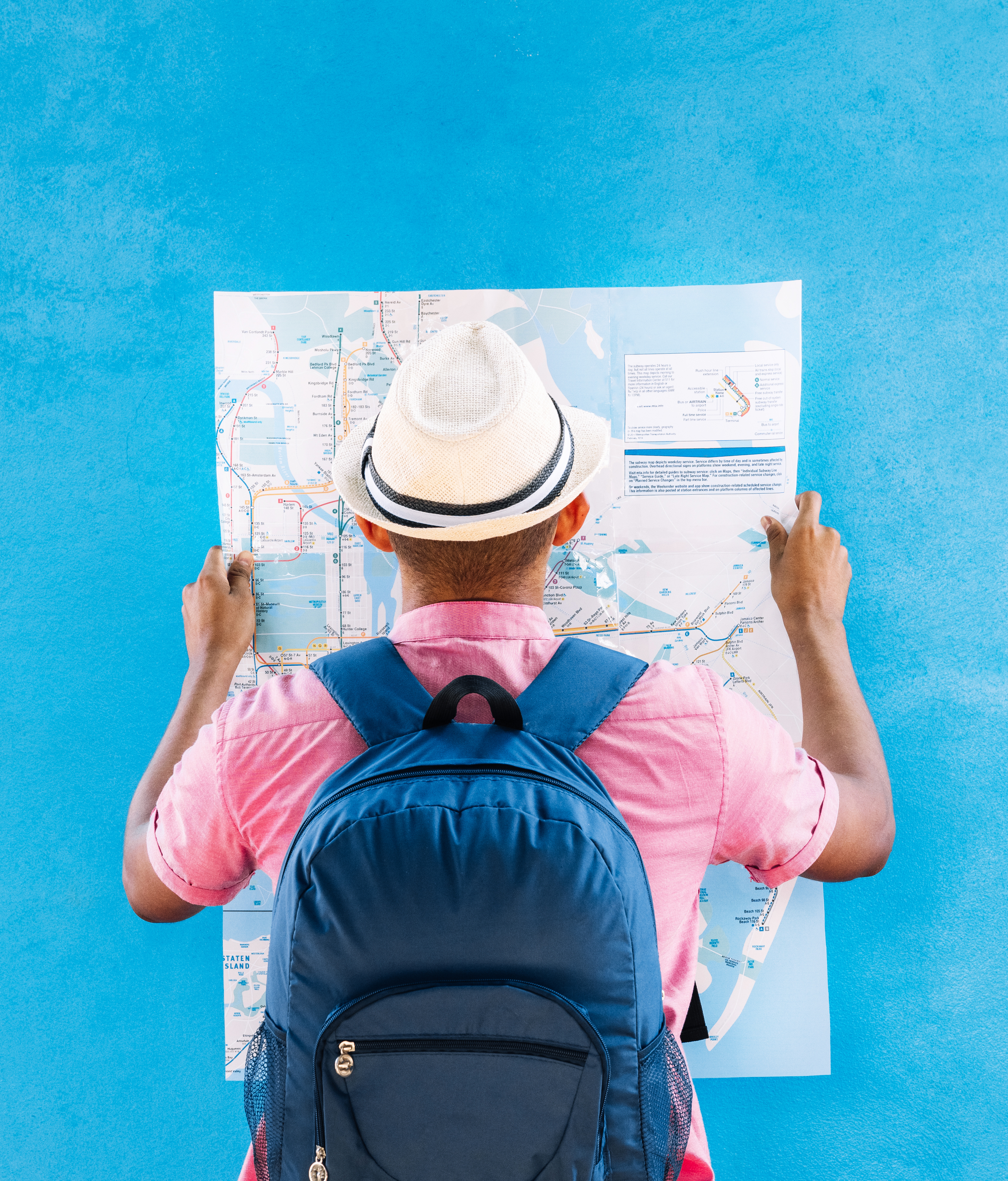 man-with-sad-travel-hat-backpack-looking-map-frodd